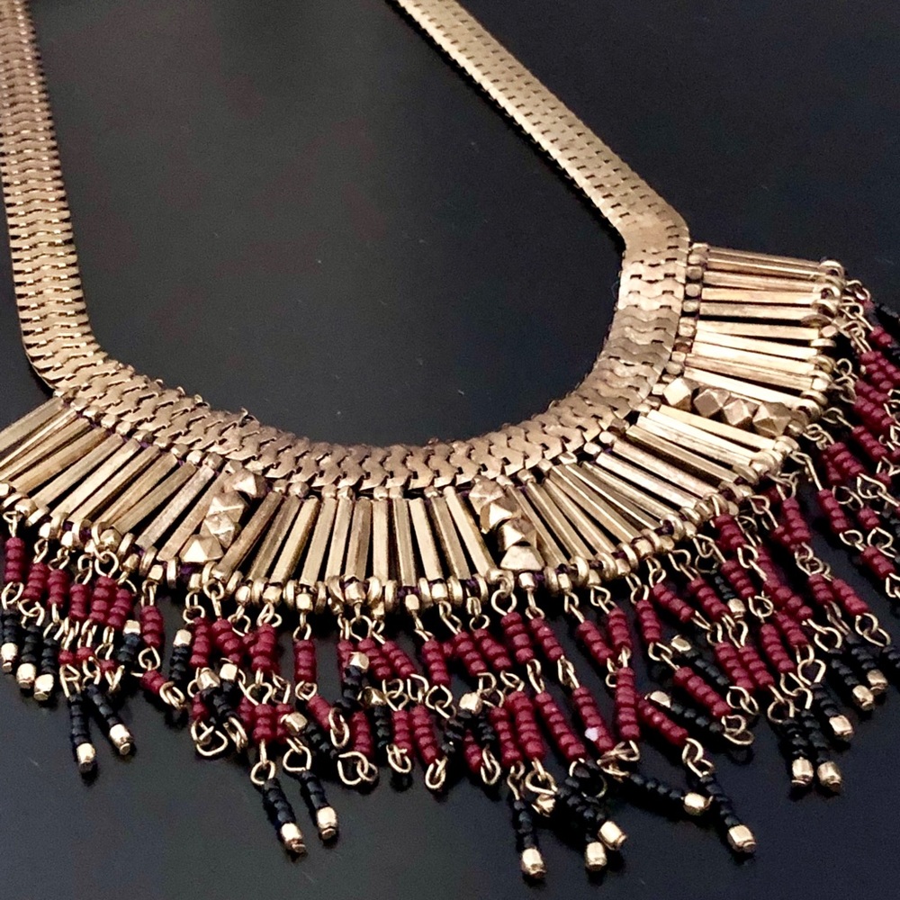 Red, gold, and black necklace